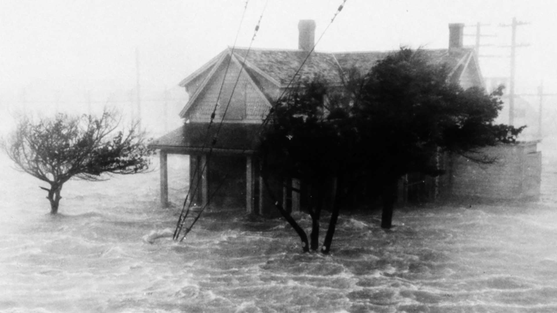Storm surge pushing water ashore during a hurricane.